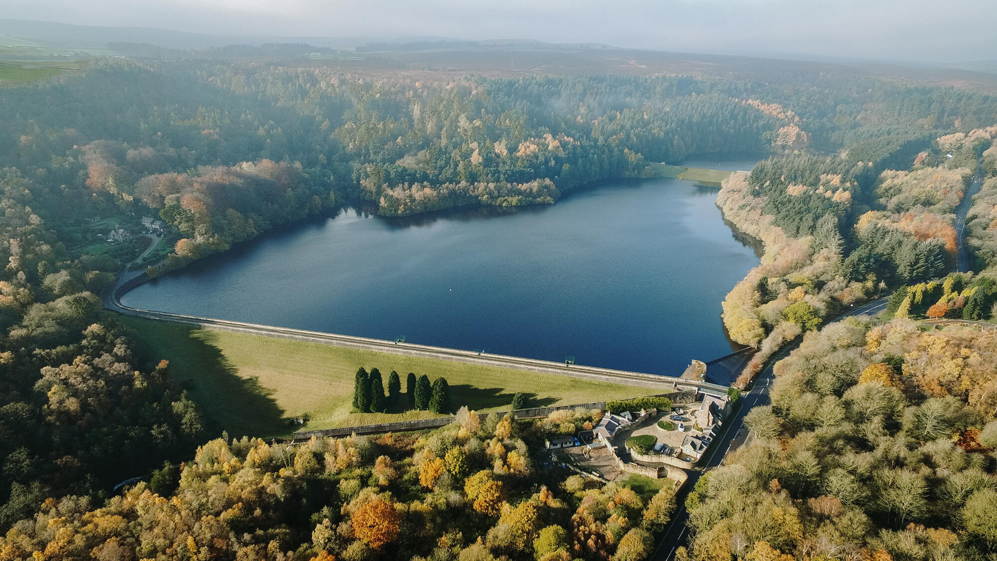 An aerial short of the Rivelin Dams and trees  - Arborists